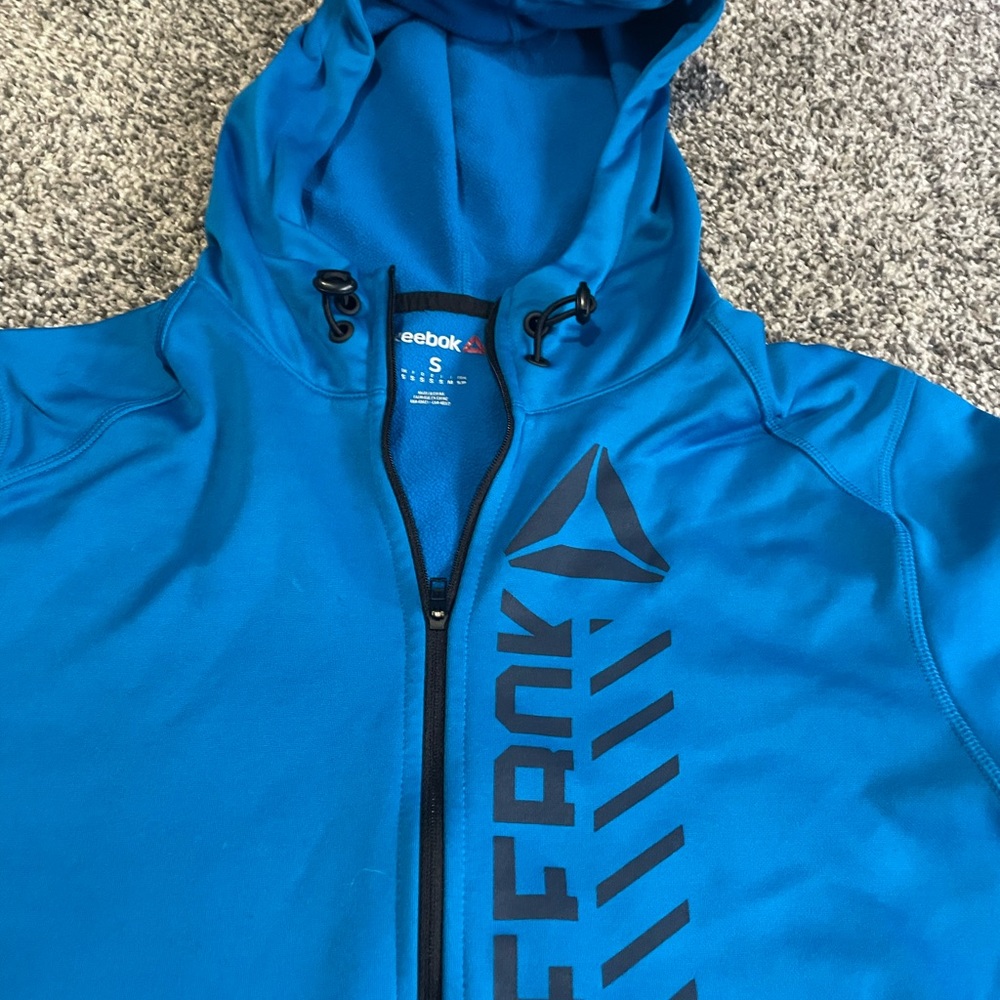 Blue Reebok hoodie. Size small.